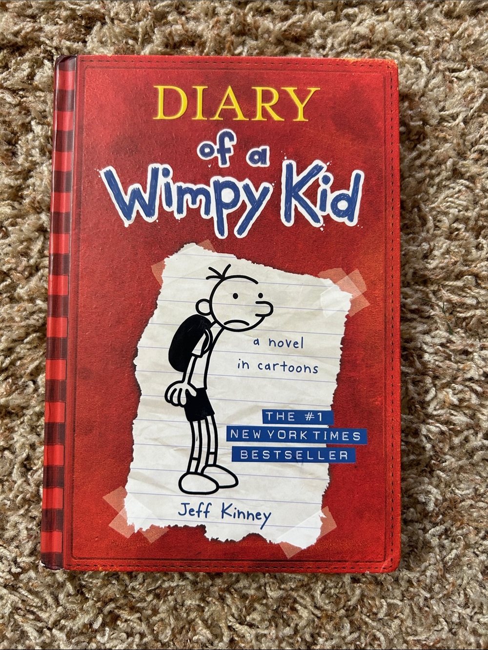Diary of a Wimpy Kid by Jeff Kinney - Red Kids Book